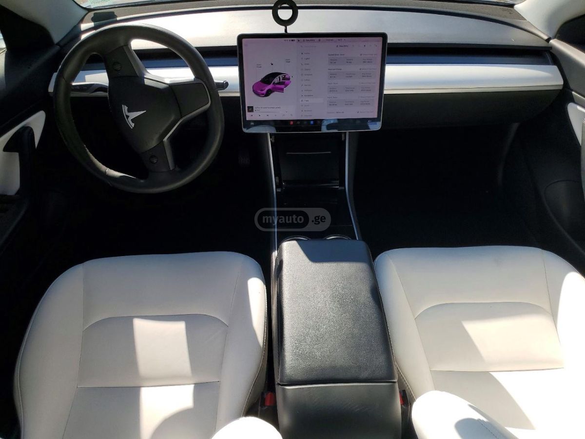 Tesla Model 3 - фото 8