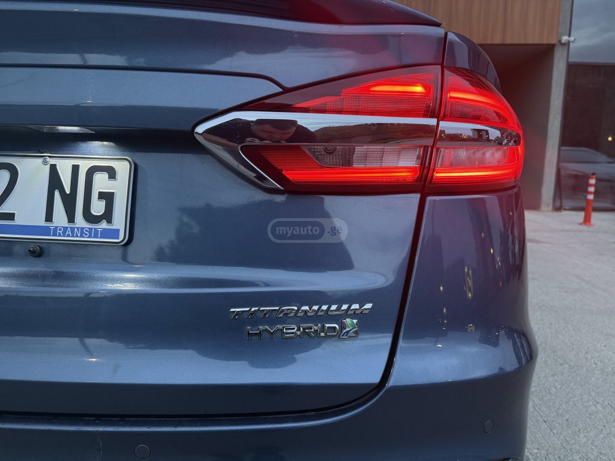 Ford Fusion - фото 12