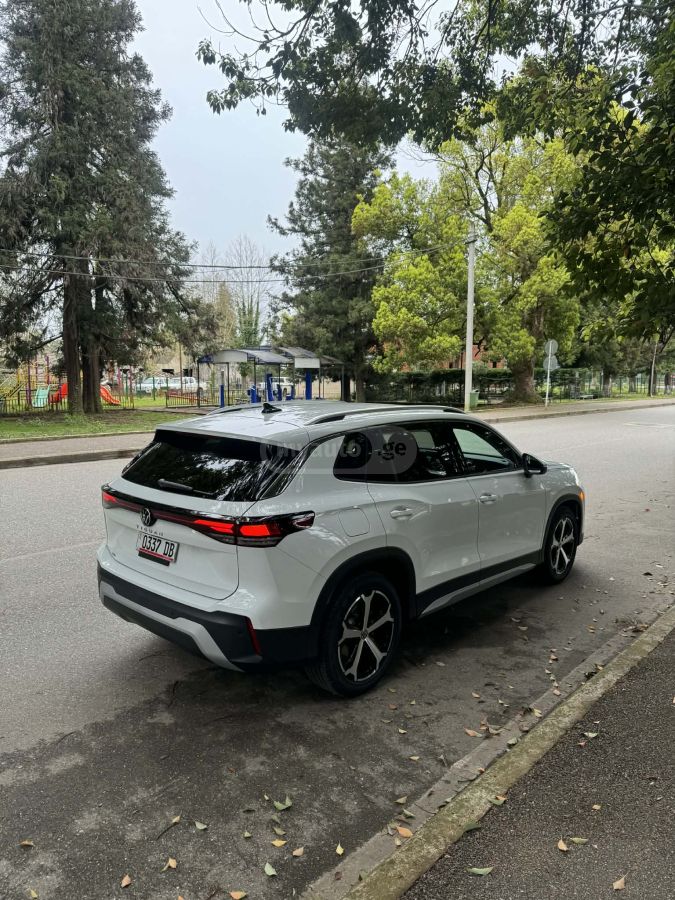 Volkswagen Tiguan - фото 2