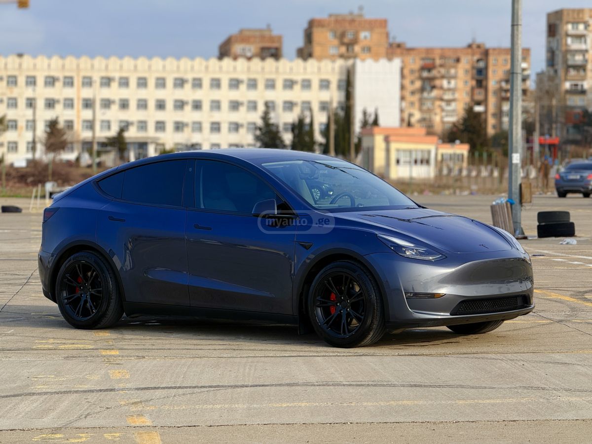 Tesla Model Y - фото 7