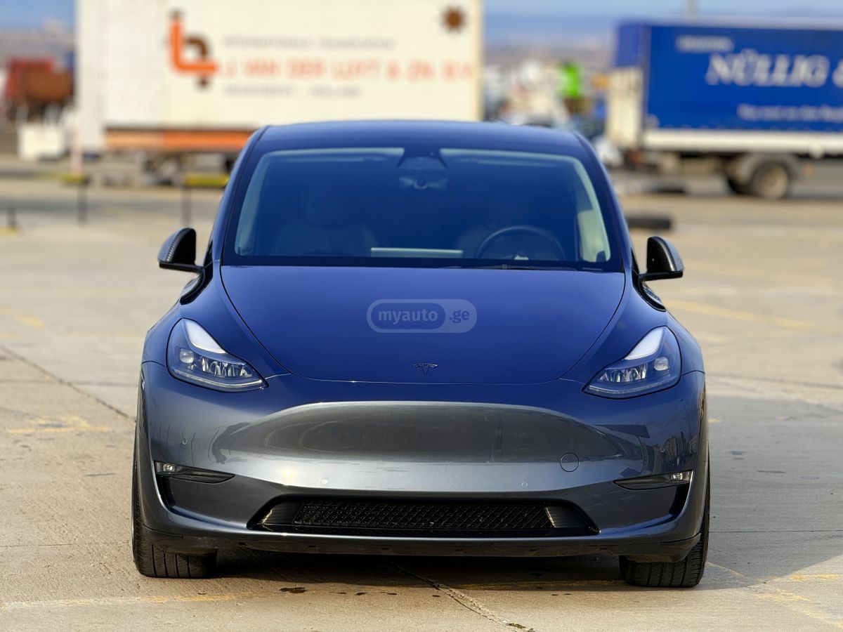 Tesla Model Y - фото 8