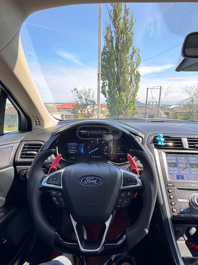 Ford Fusion - фото 11