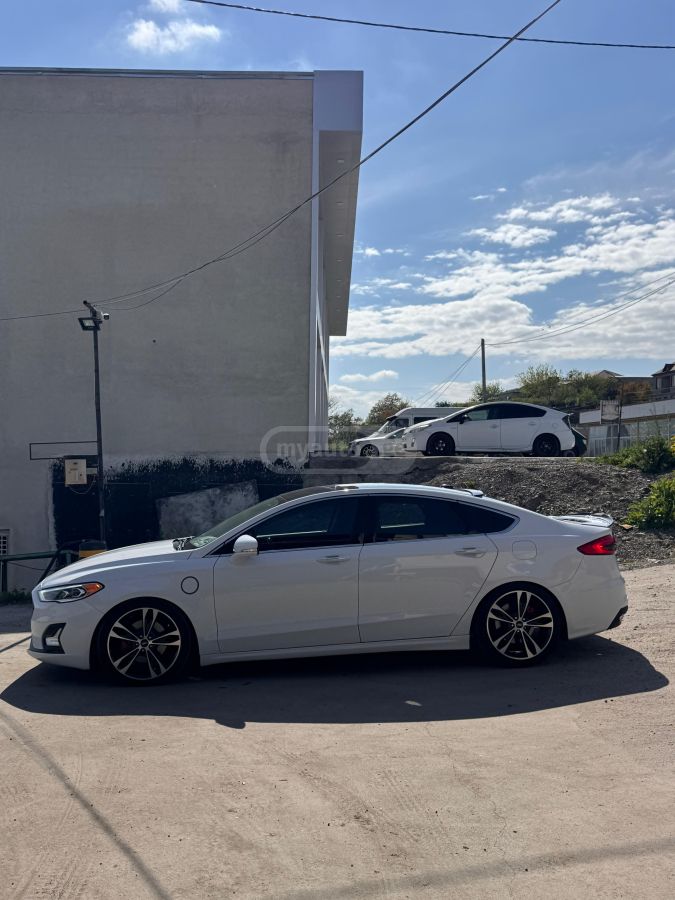 Ford Fusion - фото 7