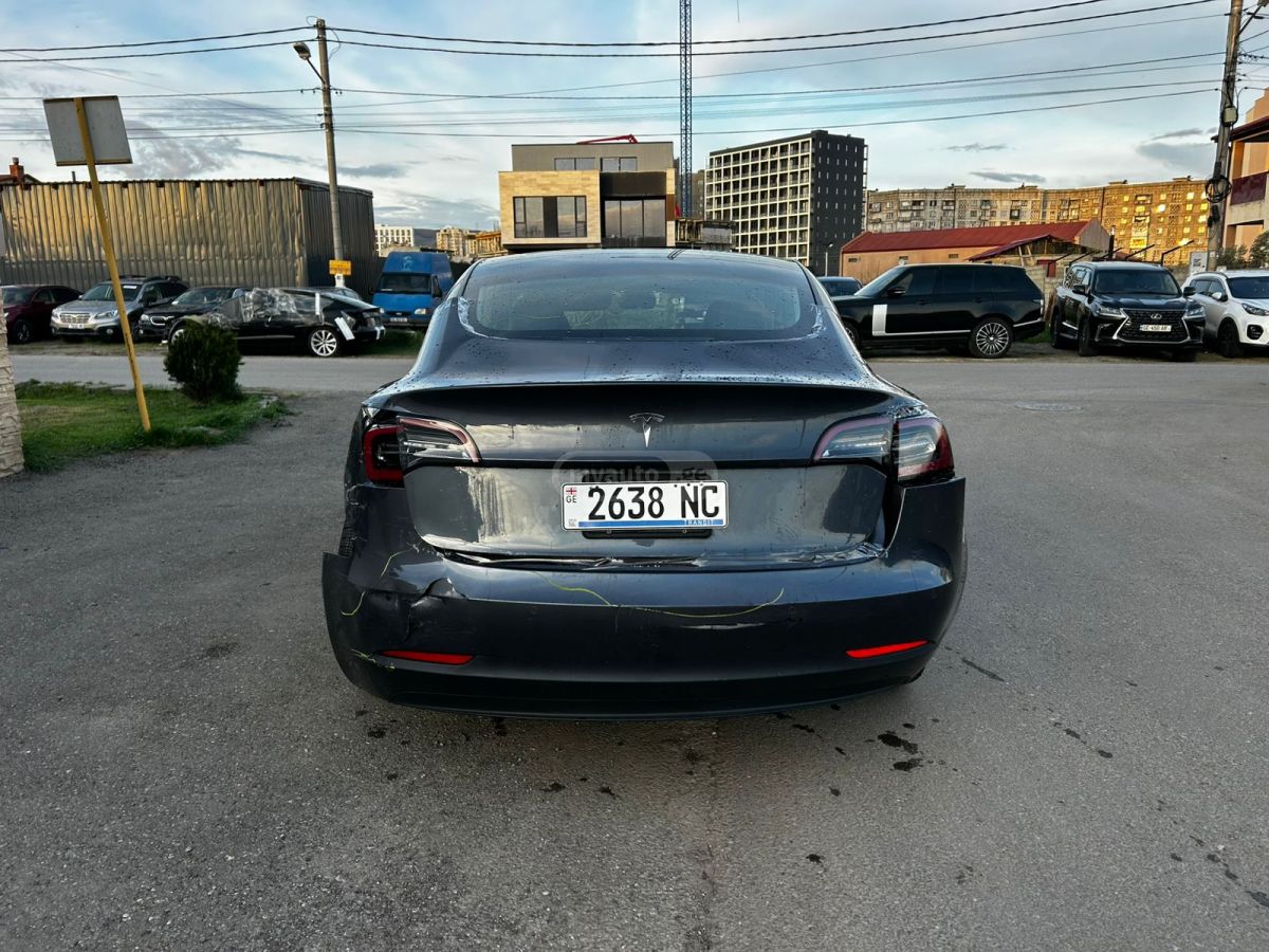Tesla Model 3 - фото 8