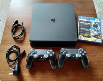 PlayStation (PS4), with joysticks, warranty year, from Buy